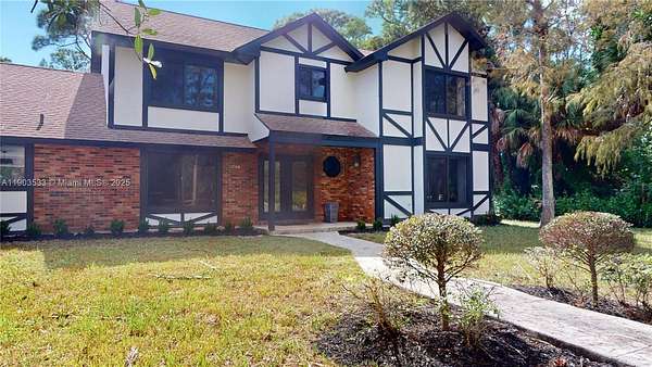 2 Acres of Residential Land with Home for Sale in Loxahatchee Groves, Florida