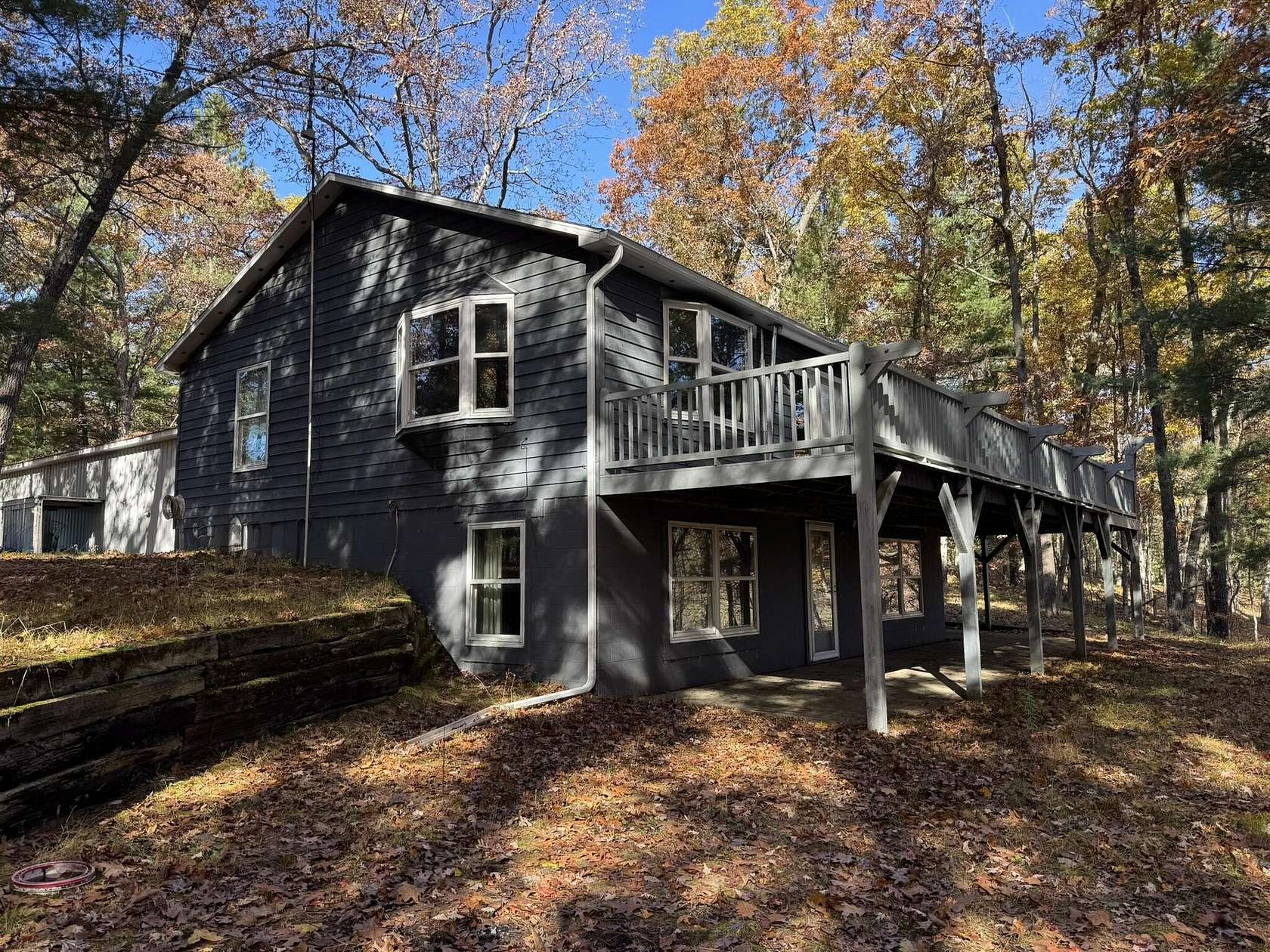 11 Acres of Recreational Land with Home for Sale in Irons, Michigan