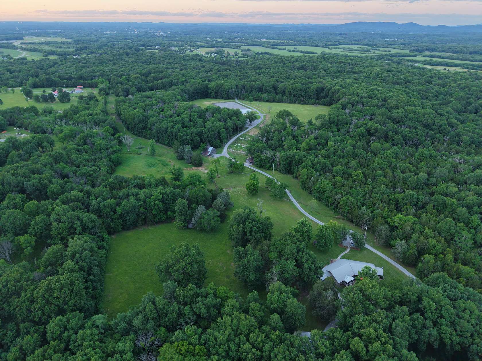 155 Acres of Land with Home for Sale in Christiana, Tennessee