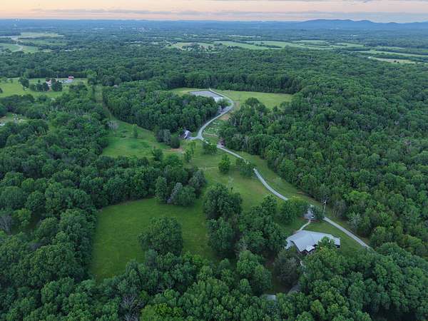 155 Acres of Land with Home for Sale in Christiana, Tennessee