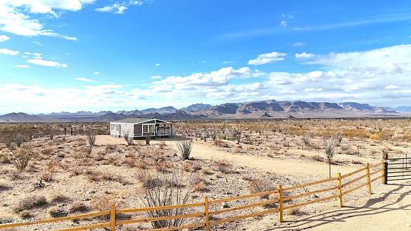 2.35 Acres of Residential Land with Home for Sale in Yucca, Arizona