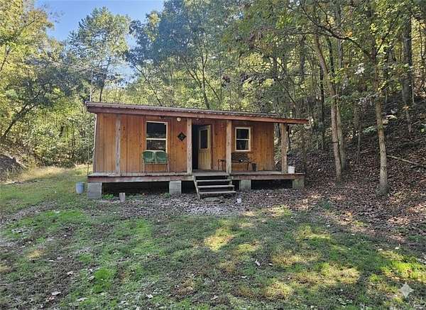 4.5 Acres of Residential Land with Home for Sale in Watts, Oklahoma