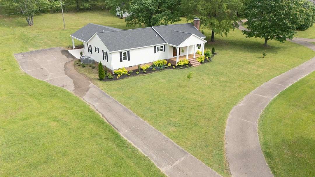 3.28 Acres of Residential Land with Home for Sale in Selmer, Tennessee