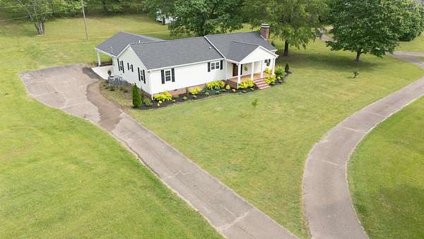 3.28 Acres of Residential Land with Home for Sale in Selmer, Tennessee