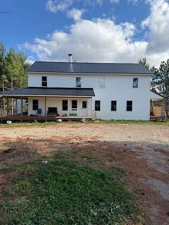 7 Acres of Land with Home for Sale in Chetek, Wisconsin
