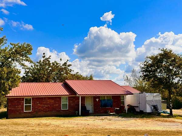 7.3 Acres of Residential Land with Home for Sale in Moyers, Oklahoma