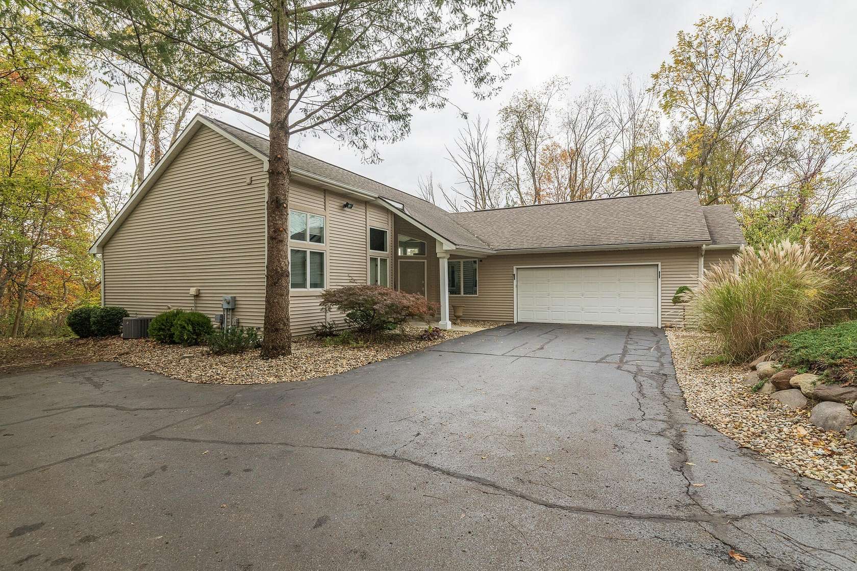 10.2 Acres of Land with Home for Sale in Portage, Michigan