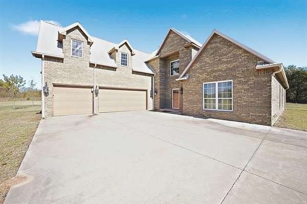 5.18 Acres of Residential Land with Home for Sale in Porter, Oklahoma