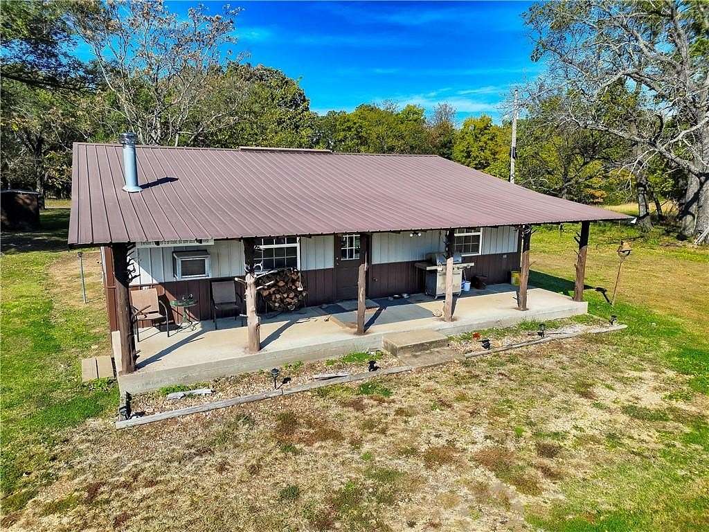 10.9 Acres of Land with Home for Sale in Stilwell, Oklahoma