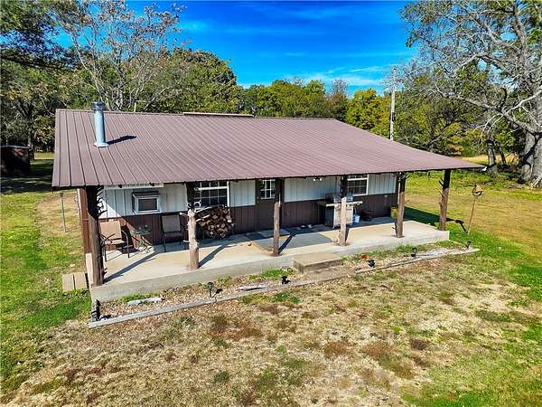 10.9 Acres of Land with Home for Sale in Stilwell, Oklahoma