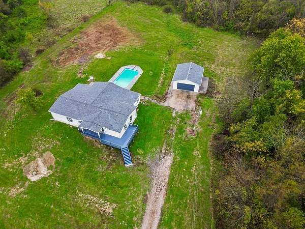 5 Acres of Residential Land with Home for Sale in Drexel, Missouri