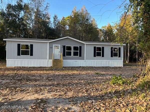 1.85 Acres of Residential Land with Home for Sale in Callahan, Florida