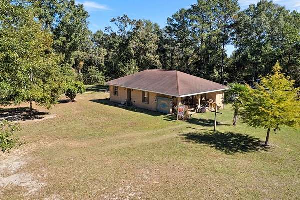 1.5 Acres of Land with Home for Sale in Poplarville, Mississippi