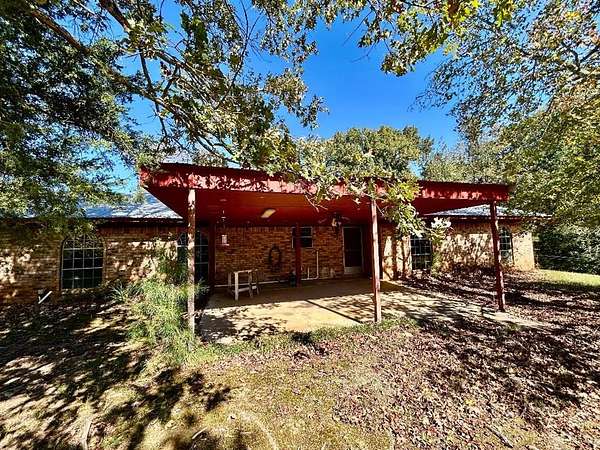 42.5 Acres of Recreational Land with Home for Sale in Douglassville, Texas