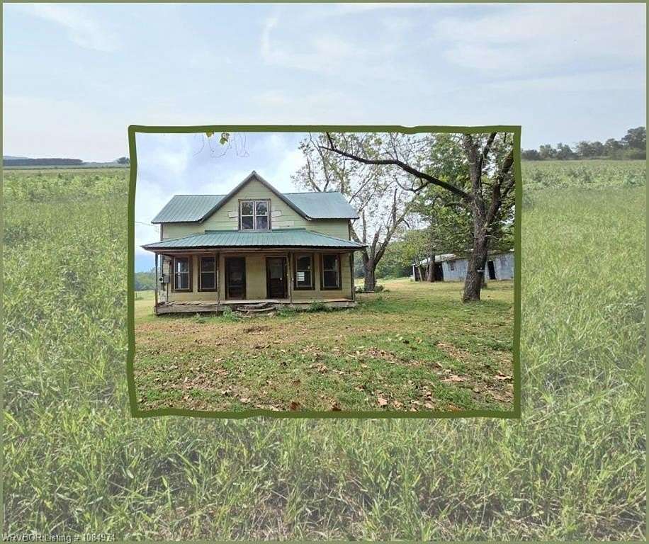 42 Acres of Land with Home for Sale in Paris, Arkansas