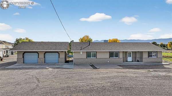 2.5 Acres of Residential Land with Home for Sale in Florence, Colorado