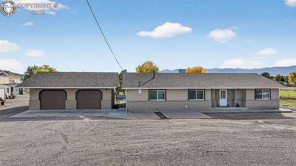 2.5 Acres of Land with Home for Sale in Florence, Colorado