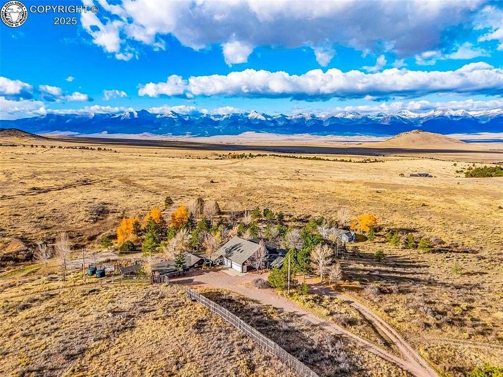 214 Acres of Recreational Land with Home for Auction in Westcliffe, Colorado