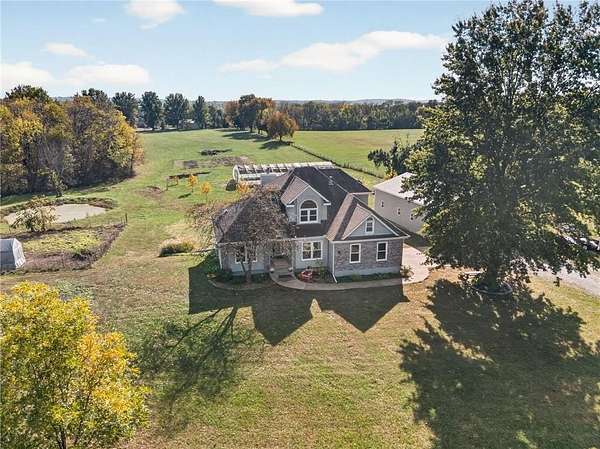 10 Acres of Land with Home for Sale in Oak Grove, Missouri