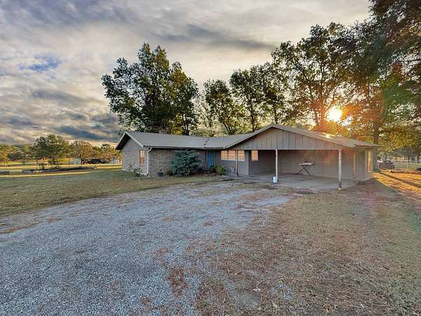 7.32 Acres of Land with Home for Sale in Wilburton, Oklahoma