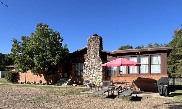 9 Acres of Residential Land with Home for Auction in Alexander, Arkansas