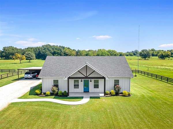 4 Acres of Residential Land with Home for Sale in Sulphur Springs, Texas