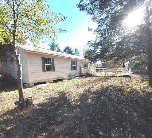 1.6 Acres of Residential Land with Home for Sale in Bonham, Texas