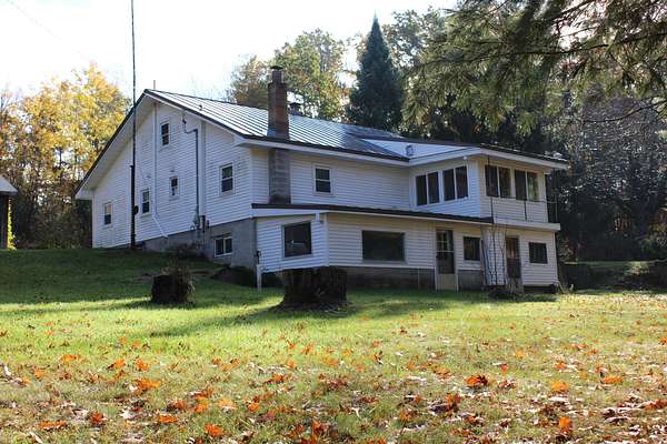 150 Acres of Recreational Land with Home for Sale in Harrison, Michigan