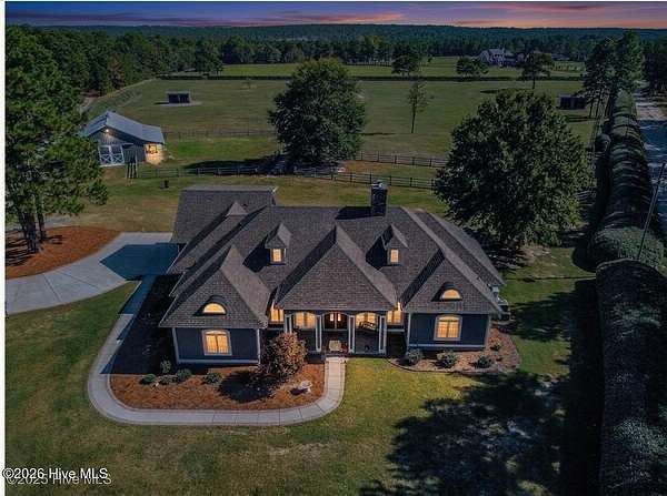 10.9 Acres of Land with Home for Sale in Vass, North Carolina