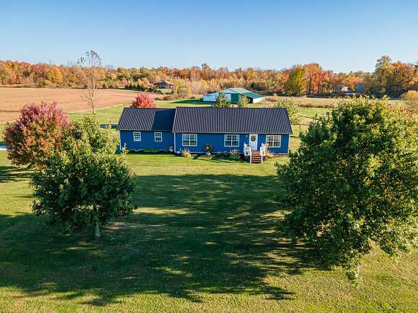 6.9 Acres of Land with Home for Sale in Mount Gilead, Ohio