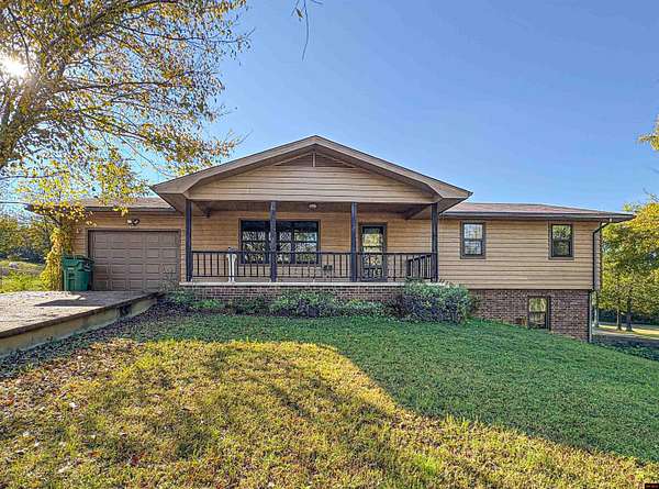 2.5 Acres of Residential Land with Home for Sale in Flippin, Arkansas