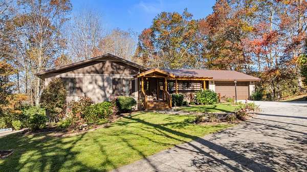 1.69 Acres of Residential Land with Home for Sale in Cashiers, North Carolina