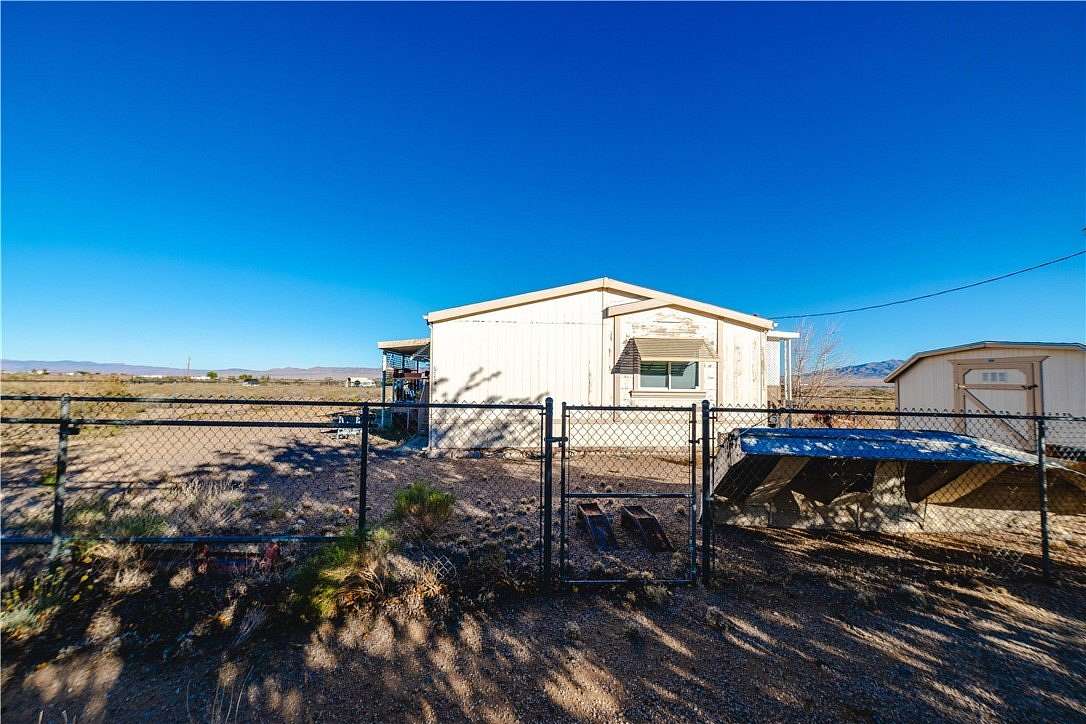 5.5 Acres of Residential Land with Home for Sale in Kingman, Arizona