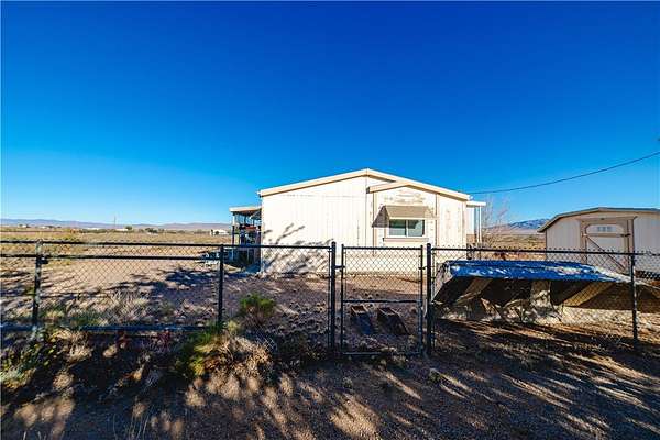 5.5 Acres of Residential Land with Home for Sale in Kingman, Arizona