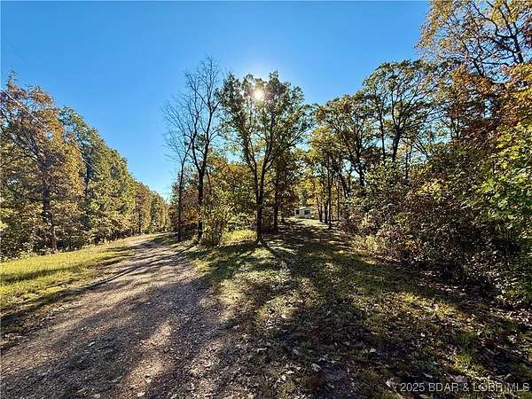 9.5 Acres of Residential Land with Home for Sale in Gravois Mills, Missouri