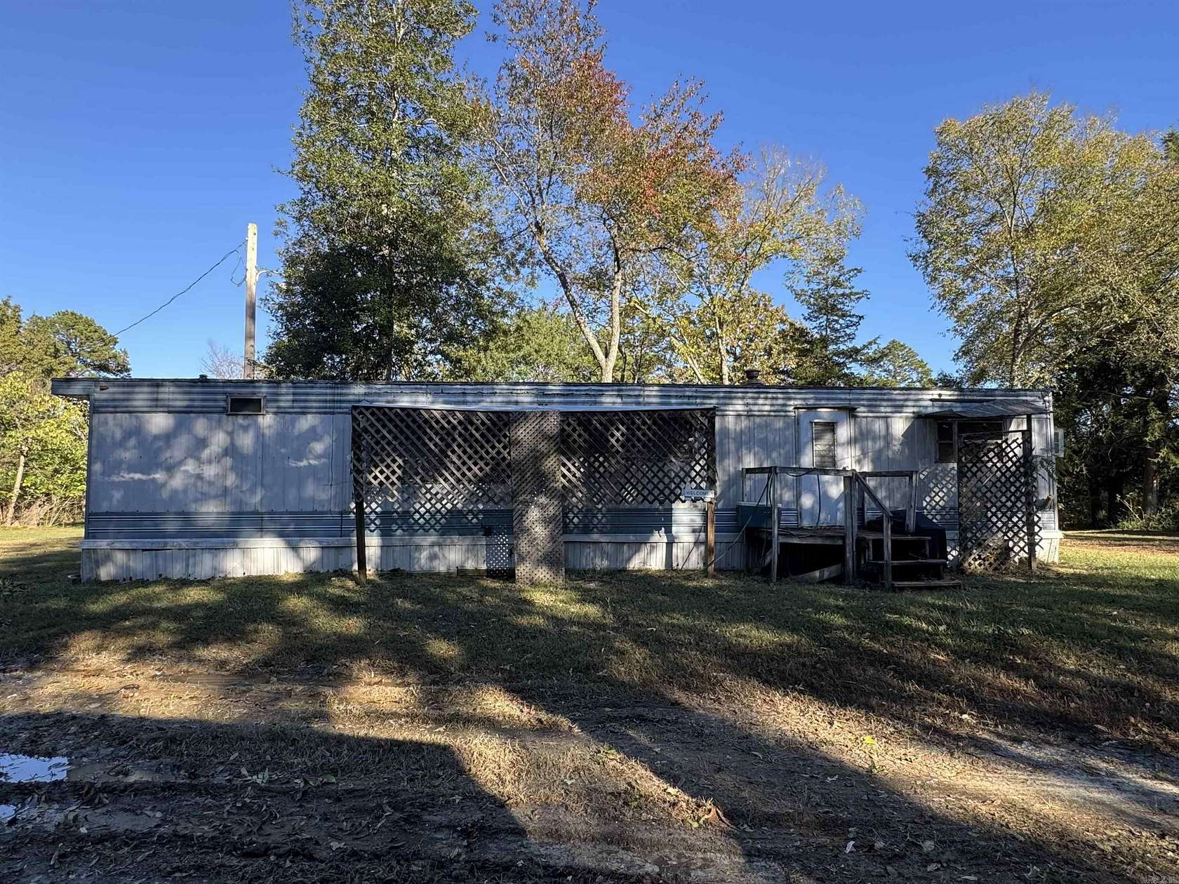 10 Acres of Land with Home for Sale in Hatfield, Arkansas
