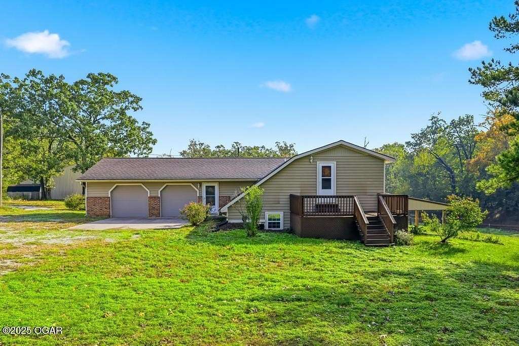 19 Acres of Land with Home for Sale in Carthage, Missouri