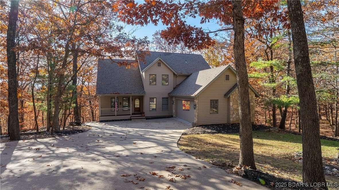 1.6 Acres of Residential Land with Home for Sale in Linn Creek, Missouri