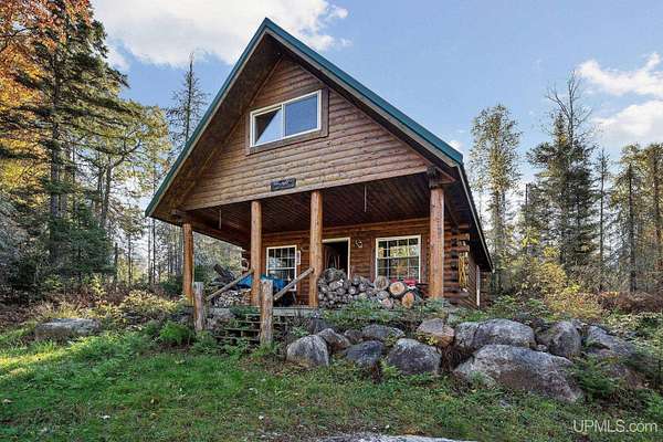 276 Acres of Recreational Land with Home for Sale in Republic, Michigan