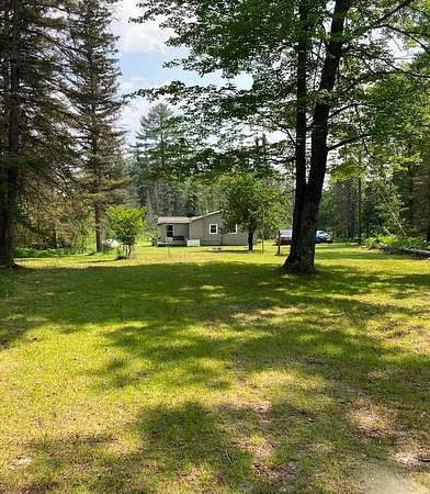 5 Acres of Residential Land with Home for Sale in Atlanta, Michigan