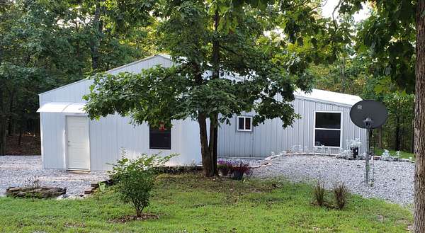 16.6 Acres of Land with Home for Sale in Aurora, Missouri