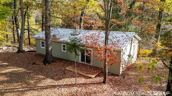 3.37 Acres of Residential Land with Home for Sale in Twin Lake, Michigan