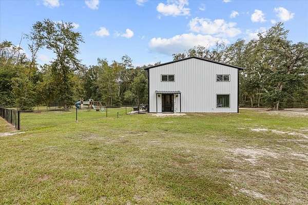 5 Acres of Residential Land with Home for Sale in Lake City, Florida