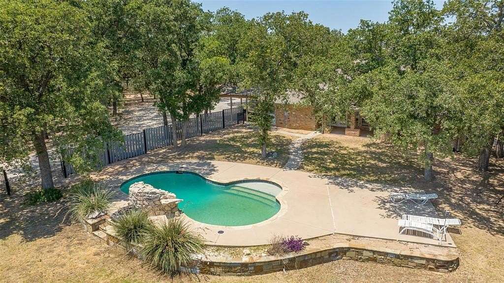 5 Acres of Residential Land with Home for Sale in Lipan, Texas