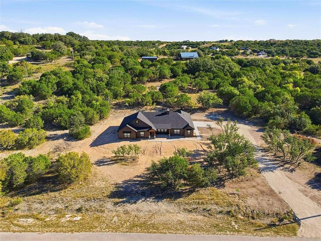 4 Acres of Residential Land with Home for Sale in Bluff Dale, Texas