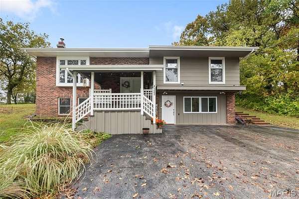 2.15 Acres of Residential Land with Home for Sale in Oakville, Missouri