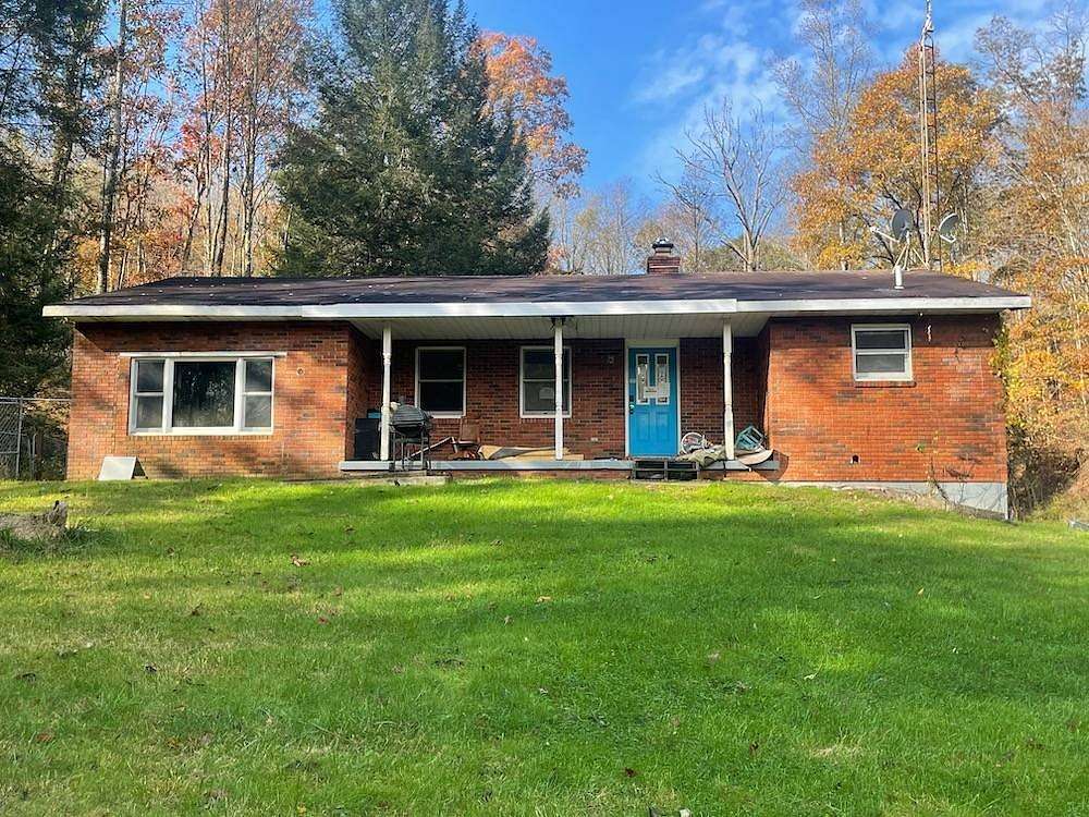 5.2 Acres of Residential Land with Home for Auction in Jackson, Ohio