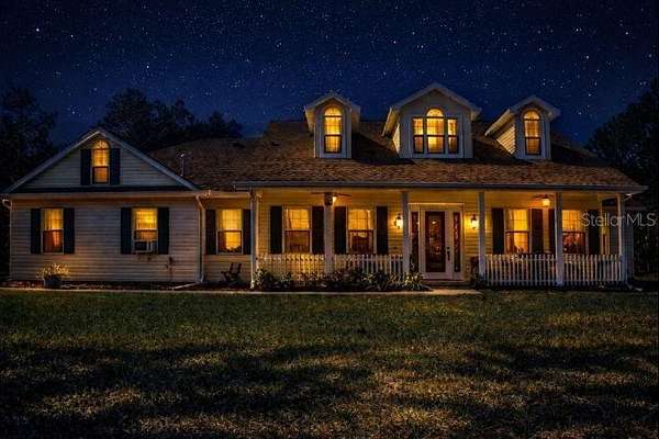 2.2 Acres of Residential Land with Home for Sale in Weeki Wachee, Florida