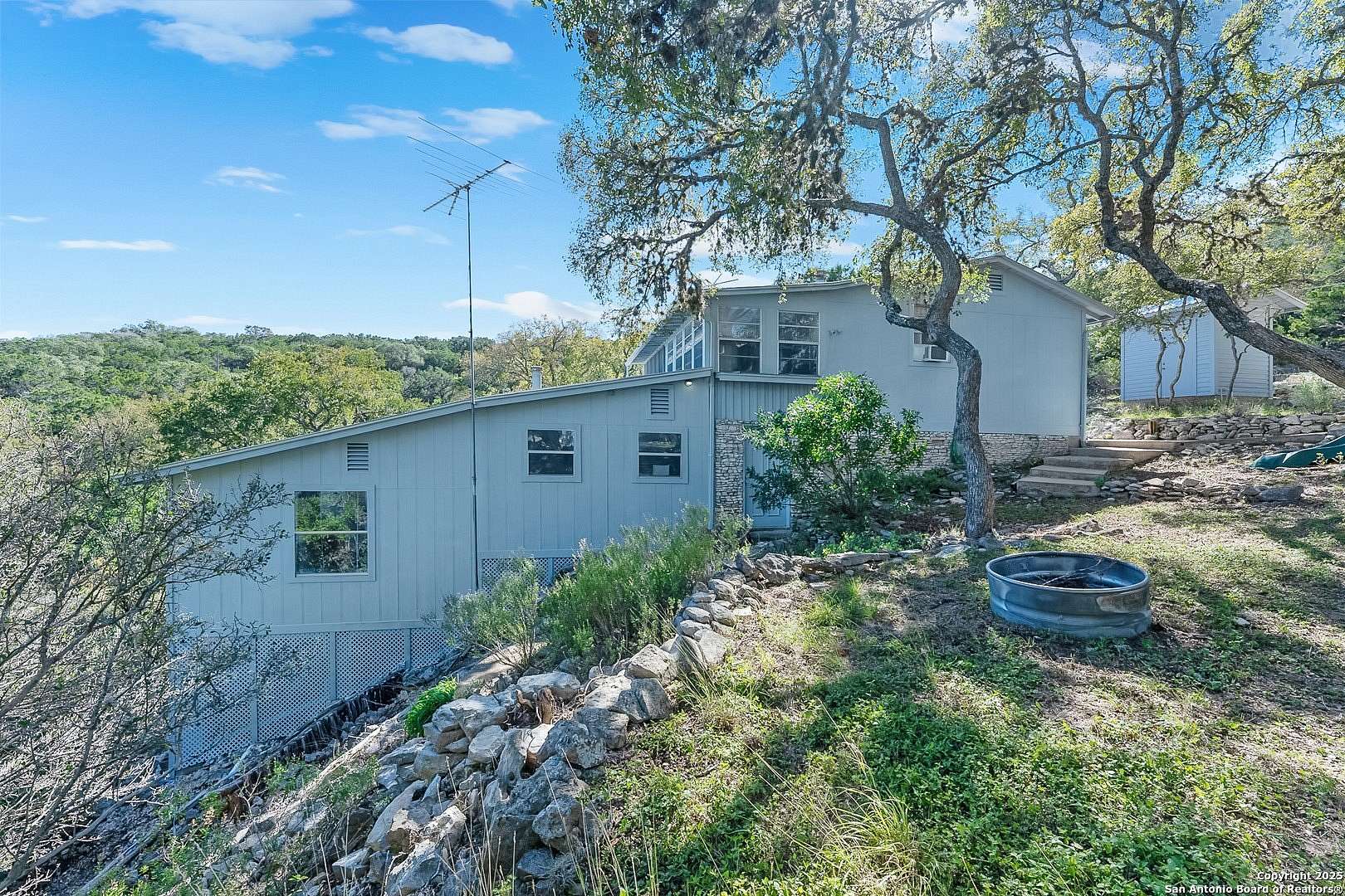 1.55 Acres of Residential Land with Home for Sale in Lakehills, Texas