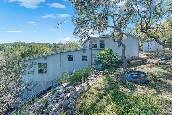 1.55 Acres of Residential Land with Home for Sale in Lakehills, Texas